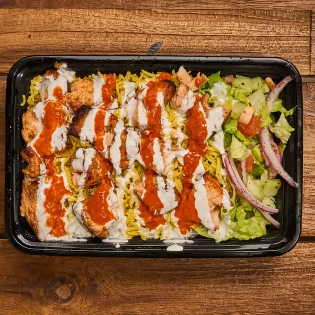 Salmon Kebab Over Rice.